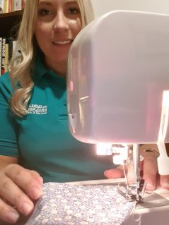Hayley Flint working at sewing machine